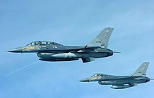 Two Royal Thai Air Force F-16 aircraft fly in formation March 17, 2009, as a part of the aerial missions of Exercise Cope Tiger in Korat, Thailand.