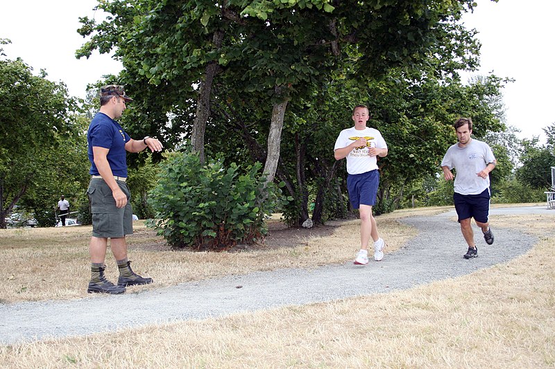 File:US Navy 090804-N-5366K-094 Chief Special Warfare Operator (SEAL) Jason Torey keeps time as KNDD radio station host Andrew Harms, right, runs 1.5 miles to practice for the Navy SEAL Fitness Challenge at Surrey Downs Park.jpg