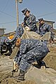 US Navy 110406-N-6611F-024 Senior Chief Personnel Specialist Amy Henson, from Sheboygan, Wis., and Chief Yeoman Kenneth Vinoya, from Jacksonville,.jpg