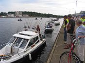 Trolling boats at the Finnish trolling championships on Pielisjoki River in Finland