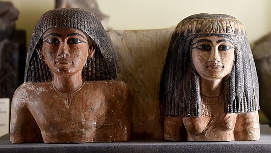 Upper part of a statuette of an Egyptian man and his wife. 18th Dynasty, Amelia Edwards Collection at the Petrie Museum of Egyptian Archaeology