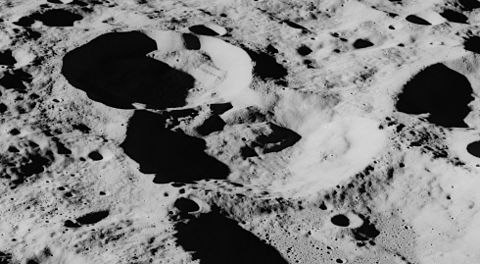 Oblique Apollo 16 image, facing north. Van Gent at center, Van Gent X in upper left. Van Gent crater AS16-M-0725.jpg