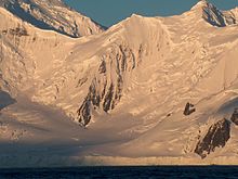 Vihren Peak from Bransfield Strait, with Vitosha Saddle to the left and Magura Glacier in the foreground. Vihren.jpg