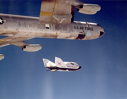 The X-38 V-132 research vehicle drops away from NASA's B-52 mothership immediately after being released from the wing pylon