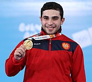 2018-10-11 Victory ceremony (Weightlifting Boys' 77kg) at 2018 Summer Youth Olympics by Sandro Halank-001.jpg