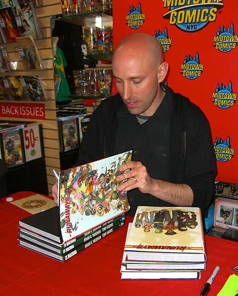 Writer Brian K. Vaughan signing hardcover copies of the series at Midtown Comics in Manhattan.
