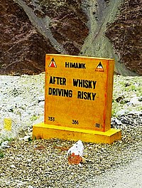 "After whiskey driving risky" safety road sign in Ladakh, India After Whiskey Driving Risky.jpg