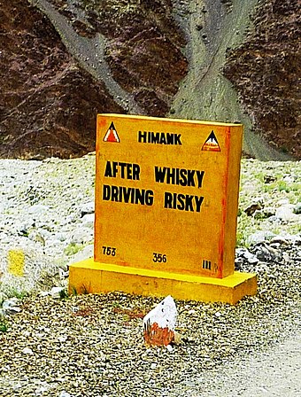"After Whisky Driving Risky." Safety roadsign in Ladakh, India
