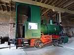 Antigua locomotora de vapor O & K, en el hotel-museo de Puerto Bories, Natales, Magallanes, Chile.jpg