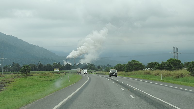 File:Approaching Tully from the south on the Bruce Highway, the steam rising is from the Tully Sugar Mill, 2016.jpg