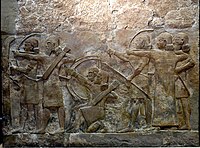 Assyrian archers attacking a city. From Khorsabad, Iraq. The Iraq Museum