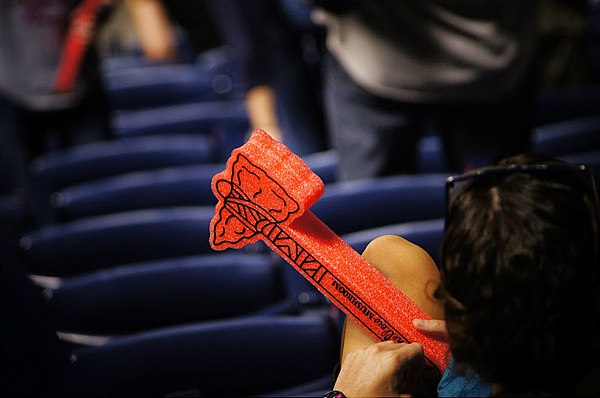 The Atlanta Braves encouraged fans to gesture with the tomahawk chop, distributing foam tomahawks at games and other events.