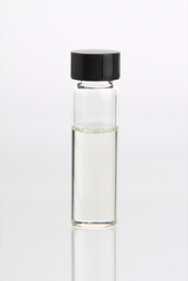 Balsam fir essential oil in clear glass vial