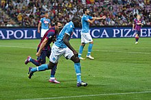 Koulibaly agli esordi nel Napoli, durante l'amichevole contro il Barcellona dell'estate 2014
