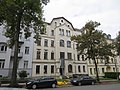 Apartment building in closed development with front garden