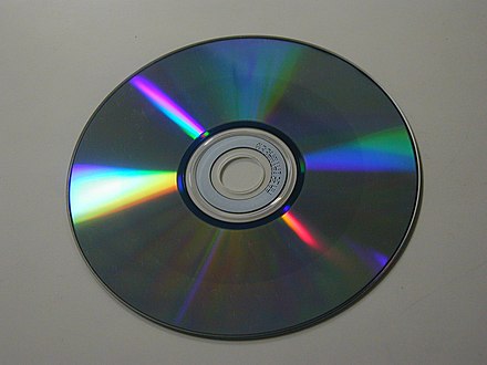 CD-RW with distinctively darker data surface than a CD-R and a factory-pressed CD-ROM.