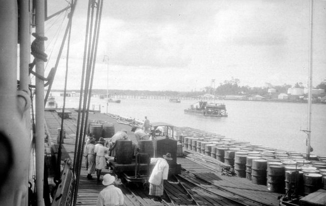 A pier and oil barrels in Tarakan during the Dutch colonial period, ca. 1925