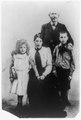 Capt. Alfred Dreyfus, full-length portrait, standing, facing front, with wife(?) and two children LCCN89714532.tif
