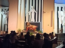 Pilgrims pray before the Altar of Repose at the Shrine of Jesus the Divine Word in Quezon City as part of the Visita Iglesia. Catholics venerate the Blessed Sacrament at SVD Quezon City 2022-04-14.jpg