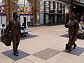 Chance meeting sculpture Statues of Ken Dodd and Bessy Bradock at Liverpool Lime Street Railway station.