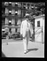 Charles Evans Hughes; State, War and Navy building in background, Washington, D.C.tiff