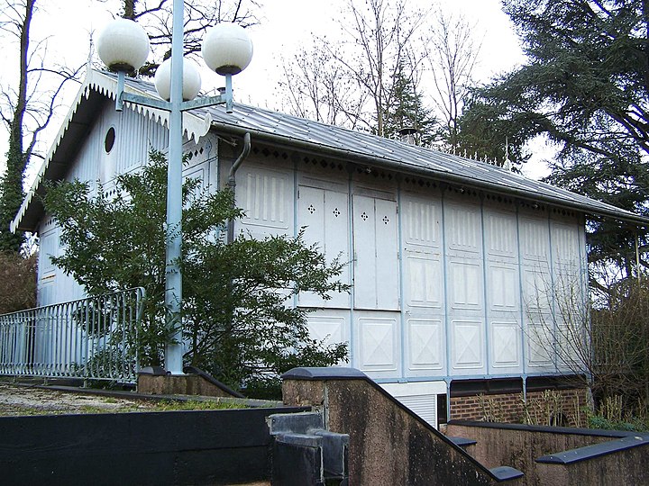 The "Iron House", a prefabricated galvanized steel house designed by Gustave Eiffel, used as a ticket booth in the Exposition, now a park shelter in Dampierre