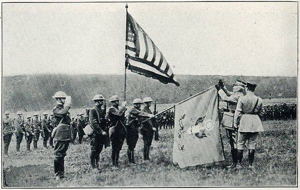 Decoration of regimental colors by General Passaga, 32nd French Army Corps.