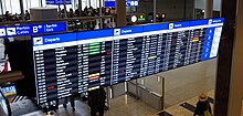Digital signage as a flight information display system at Geneva Airport in Switzerland Departure board at Geneva Airport.jpg