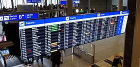 Departure board at Geneva Airport.jpg