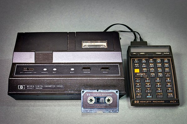 The programmable calculators of the HP-41-series (from 1979) could store data via an external magnetic tape storage device on microcassettes.