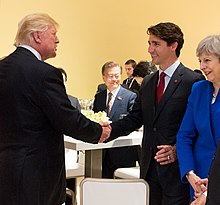 Donald Trump, Justin Trudeau and Theresa May Donald Trump, Justin Trudeau and Theresa May at the G20 Summit in Germany on 7 July 2017.jpg