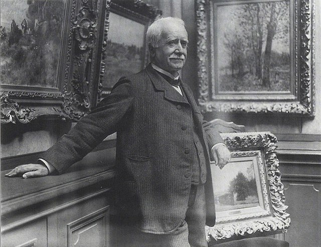 Paul Durand-Ruel in his gallery in 1910. Photo by Dornac