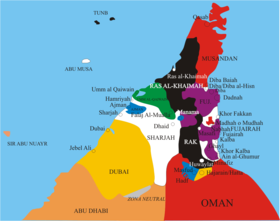 Distribuția teritorială între Oman (în roșu) și emiratele care constituie Emiratele Arabe Unite