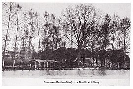 Les étangs, avec lavoir, en amont du moulin, vers 1910.