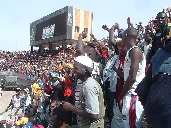 Football fans watching Gambia v Guinea