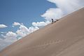 Person running down dune in Great Sand Dunes park