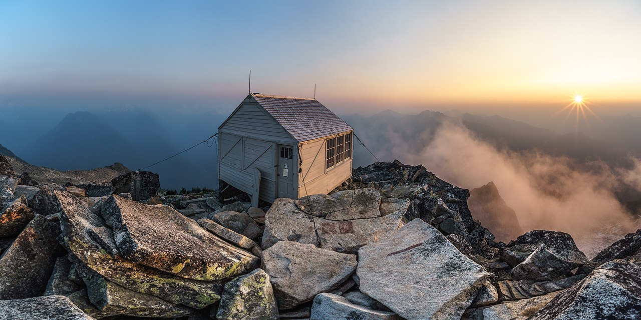 Hidden Peak Fire Lookout at sunset, with smokey haze from nearby fires.jpg