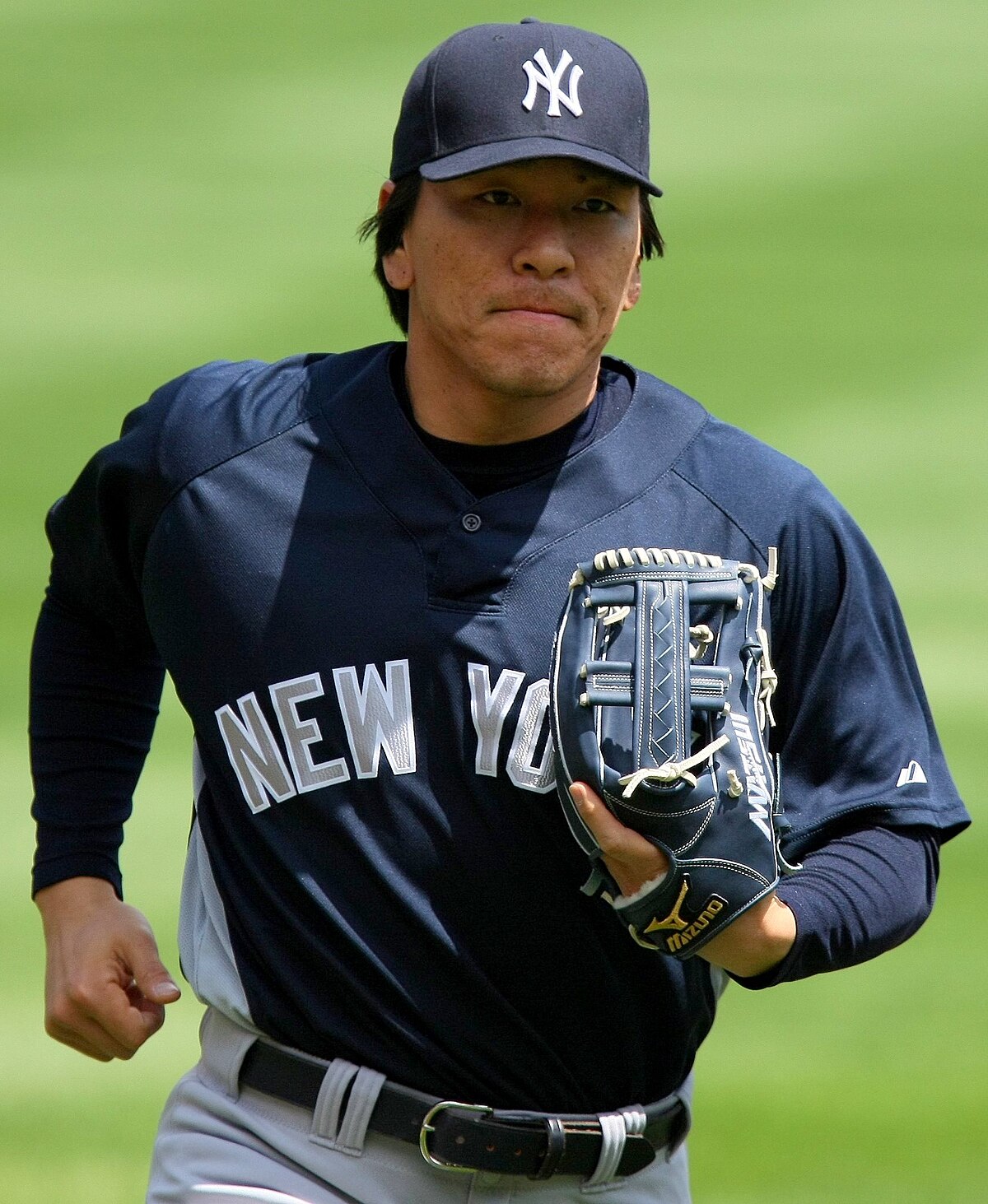 Former professional baseball player Hideki Matsui teaches children