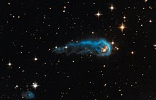This light-year-long knot of interstellar gas and dust resembles a caterpillar. Hubble sees a cosmic caterpillar.jpg