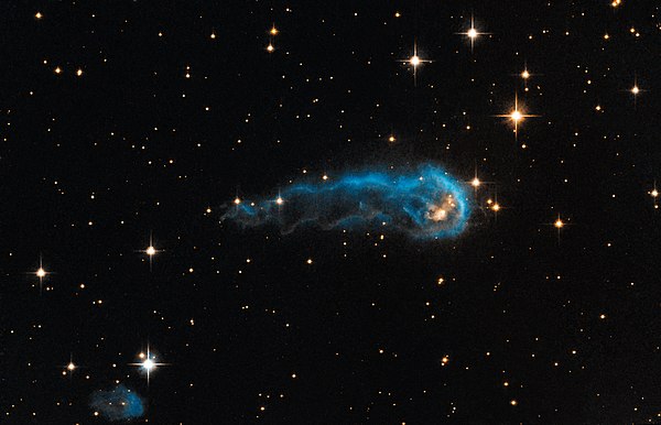 This light-year-long knot of interstellar gas and dust resembles a caterpillar.