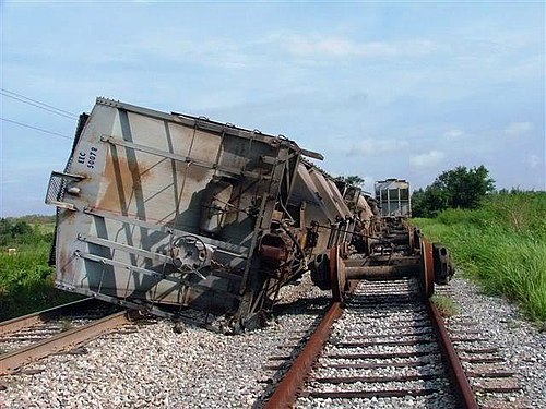 Empty railroad hopper cars toppled over as a result of high winds from Hurricane Charley in Fort Meade