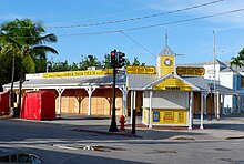 Plywood boards shield the Conch Tour Train building in Key West Hurricane Irma 06 (37375082315).jpg