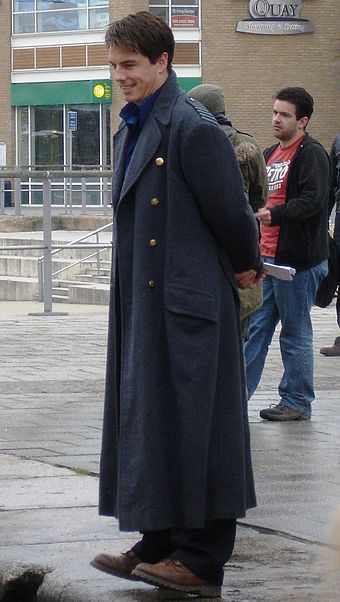 John Barrowman in Captain Jack's distinctive World War Two greatcoat during Torchwood filming.