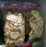 Two types of krupuk ikan (fish cracker), flat and curly