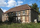 Residential house with enclosure (farm house of the former manor)