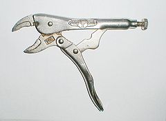 The toggle lock of many lever-action rifles is similar to the mechanism of locking pliers.  The pliers lock when the toggle mechanism is pushed over-centre.