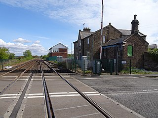 <span class="mw-page-title-main">Low Row railway station</span> Disused railway station in Cumbria on the Tyne Valley Line