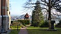 Villa with garden terrace including stairs, paving of the driveway, pavilion and fountain in the garden as well as fencing