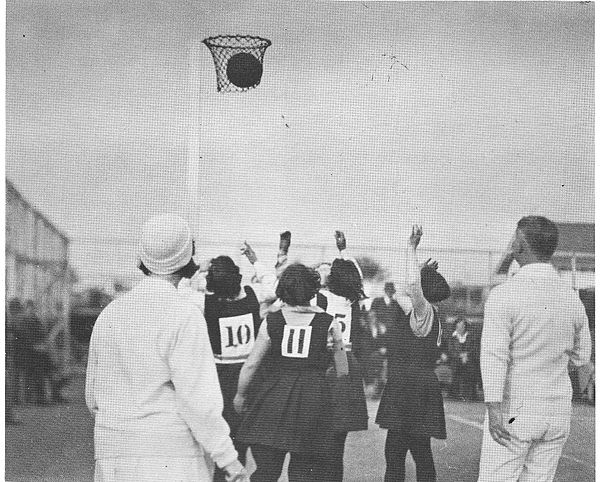 A goal is scored at a women's netball game in New Zealand, circa 1920s.