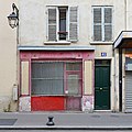 * Nomination Former shop with barred door and window, rue des Cinq-Diamants, Paris (13th arr.) --JLPC 16:38, 2 May 2014 (UTC) * Promotion Overall good quality. I'm not 100% sure if there is a slight tilt at the left side or if it is a result of what the people built there. I promoted in dubio pro reo. --Cccefalon 19:11, 2 May 2014 (UTC)